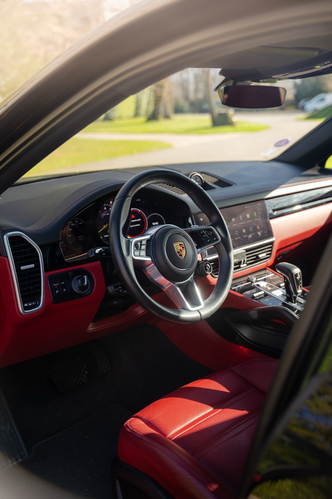 Porsche Cayenne rental interior — 5 seats, premium family comfort